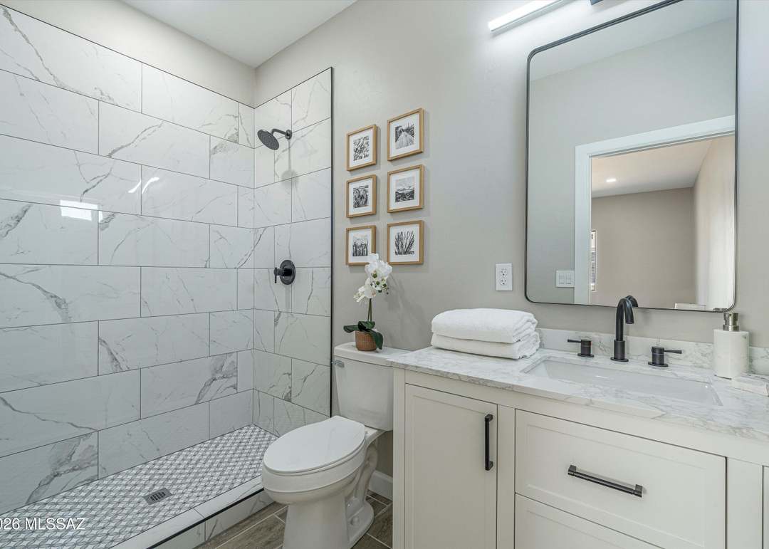 Primary bathroom with tiled shower